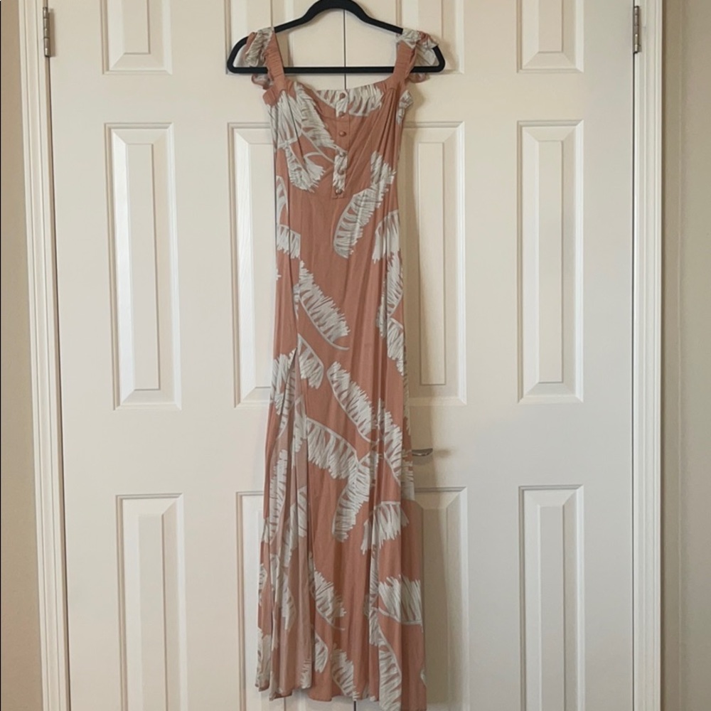 Peach colored Maxi dress with leaves print.